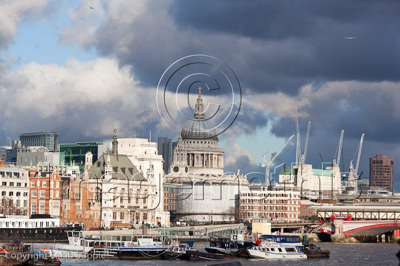 Boats docked on the Thames near St Paul's